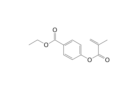 Benzoic acid, 4-[(2-methyl-1-oxo-2-propen-1-yl)oxy]-, ethyl ester