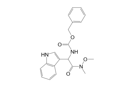 (phenylmethyl) N-[1-(1H-indol-3-yl)-2-[methoxy(methyl)amino]-2-oxidanylidene-ethyl]carbamate