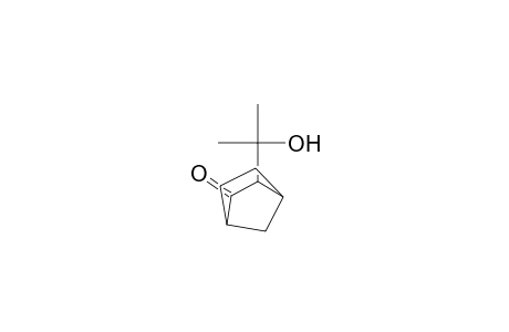 Bicyclo[2.2.1]heptan-2-one, 3-(1-hydroxy-1-methylethyl)-, endo-