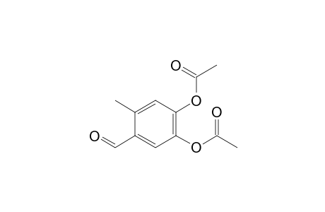 Benzaldehyde, 4,5-bis(acetyloxy)-2-methyl-