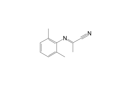 Propanenitrile, 2-[(2,6-dimethylphenyl)imino]-, (E)-