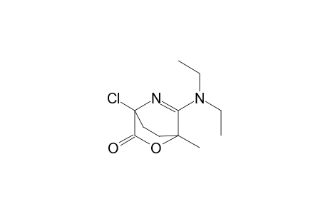 (+-)-4-Chloro-6-diethylamino-1-methyl-2-oxa-5-azabicyclo[2.2.2]oct-5-en-3-one