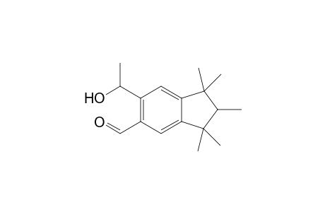 6-(1-hydroxymethyl)-1,1,2,3,3-pentamethylindane-5-carbaldehyde
