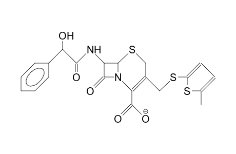 7-(2-Phenyl-2-hydroxy-acetamido)-desacetoxy-3'-(5-methyl-thiadiazol-2-ylthio)-cephalosporanic acid, anion