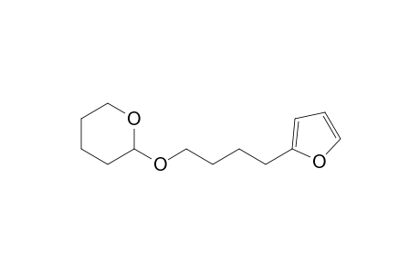 4-(2-Furanyl)-1-(tetrahydropyranyloxy)butane