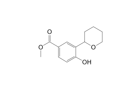 4-Hydroxy-3-(2-oxanyl)benzoic acid methyl ester