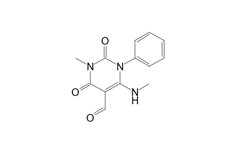 1-Methyl-4-(methylamino)-2,6-bis(oxidanylidene)-3-phenyl-pyrimidine-5-carbaldehyde