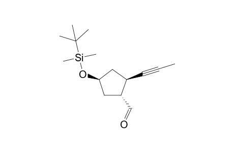 (1R,2R,4S)-4-[(tert-Butyldimethylsilyl)oxy]-2-(prop-1-yn-1-yl)cyclopentane-1-carbaldehyde