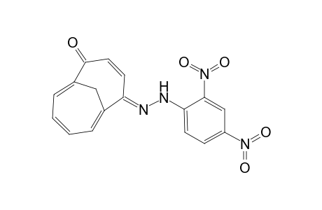 Bicyclo[4.4.1]undeca-3,6,8,10-tetraene-2,5-dione, 2-[(2,4-dinitrophenyl)hydrazone], (Z)-
