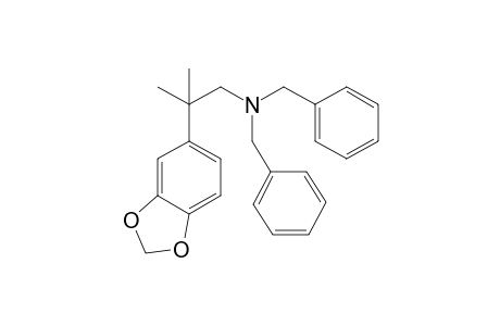 N,N-Bisbenzyl-2-methyl-2-(3,4-methylenedioxyphenyl)propan-1-amine