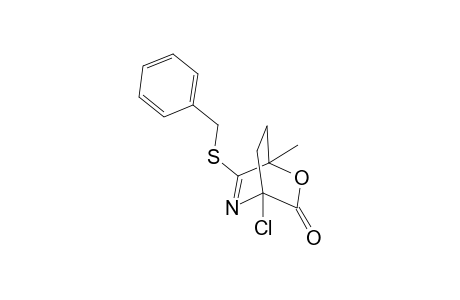 (+-)-4-Chloro-1-methyl-2-oxa-6-phenylmethylthio-5-azabicyclo[2.2.2]oct-5-en-3-one