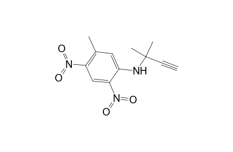 Benzenamine, 3-methyl-4,6-dinitro-N-(1,1-dimethylpropynyl)-