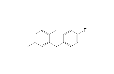 2-[(4-Fluorophenyl)methyl]-1,4-dimethylbenzene