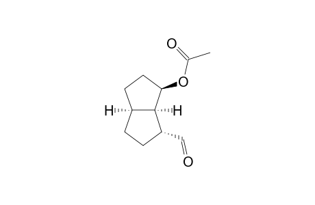 1-Pentalenecarboxaldehyde, 6-(acetyloxy)octahydro-, (1.alpha.,3a.alpha.,6.beta.,6a.alpha.)-(.+-.)-