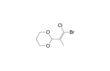 (E)-2-(1-Bromo-1-chloro-1-propen-2-yl)-1,3-dioxane