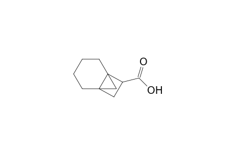 Tricyclo[4.2.1.01,6]nonane-7-carboxylic acid, endo-