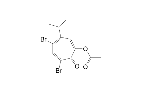 2-Acetoxy-5,7-dibromo-4-isopropyltropone
