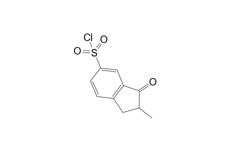 2-Methyl-3-oxoindane-5-sulfonyl Chloride