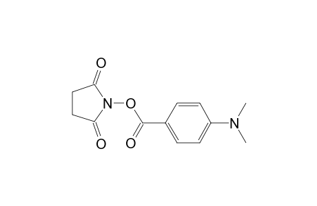 2,5-Pyrrolidinedione, 1-[[4-(dimethylamino)benzoyl]oxy]-