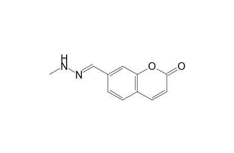 7-[(E)-(methylhydrazinylidene)methyl]-1-benzopyran-2-one