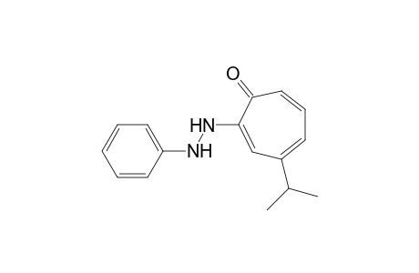 4-Isopropyl-2-(2-phenylhydrazino)tropone