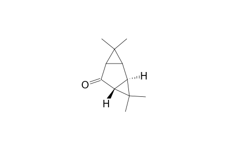 Tricyclo[4.1.0.02,4]heptan-5-one, 3,3,7,7-tetramethyl-, (1.alpha.,2.beta.,4.beta.,6.alpha.)-