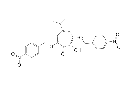 5-Isopropyl-2-hydroxy-3,7-bis(4-nitrobenzyloxy)tropone