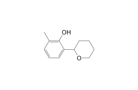 2-methyl-6-(2-oxanyl)phenol