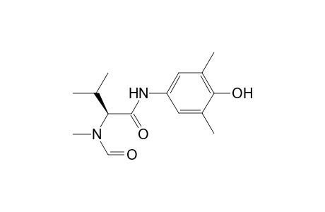 (S)-(-)-N-Methyl-N-[1-[N'-(4-hydroxy-3,5-dimethylphenylamino)-1-oxo-3-methylbut-2-yl]amino]formamide