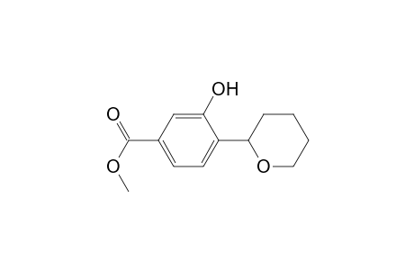 3-Hydroxy-4-(2-oxanyl)benzoic acid methyl ester