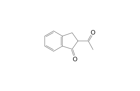 2-acetylindan-1-one