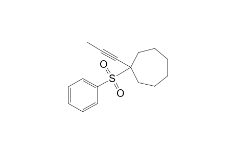 1-(Phenylsulfonyl)-1-(1-propynyl)cycloheptane
