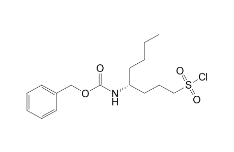 (phenylmethyl) N-[(4R)-1-chloranylsulfonyloctan-4-yl]carbamate