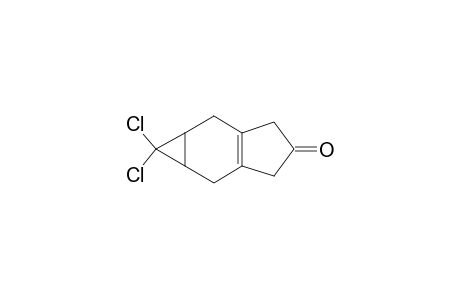 1,1-bis(chloranyl)-1a,2,3,5,6,6a-hexahydrocyclopropa[f]inden-4-one