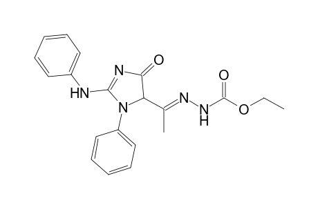 Ethyl 2-[1-(2-anilino-4-oxo-1-phenyl-4,5-dihydro-1H-imidazol-5-yl)ethylidene]hydrazinecarboxylate