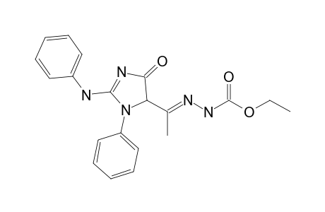 Ethyl 2-[1-(2-anilino-4-oxo-1-phenyl-4,5-dihydro-1H-imidazol-5-yl)ethylidene]hydrazinecarboxylate