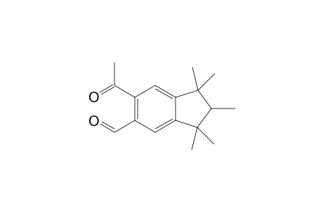 6-Acetyl-1,1,2,3,3-pentamethylindane-5-carbaldehyde