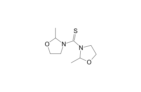 Bis(2-methyl-1,3-oxazolidin-3-yl)methanethione