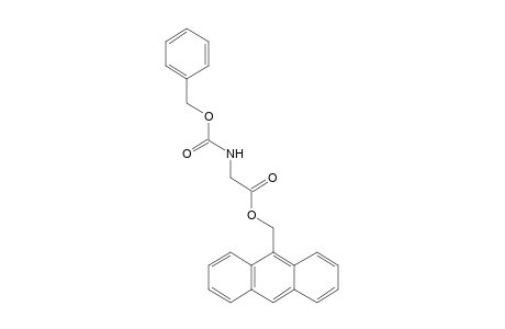 N-CARBOXYGLYCINE, 9-ANTHRYLMETHYL N-BENZYL ESTER