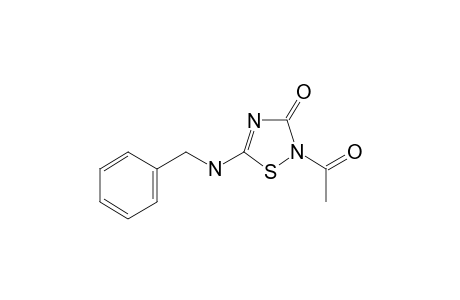 2-acetyl-5-(benzylamino)-1,2,4-thiadiazol-3-one