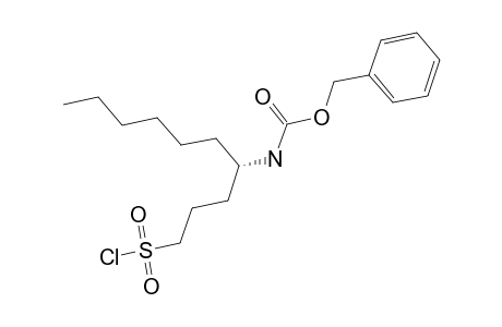 (R)-(-)-4-(BENZYLOXYCARBONYLAMINO)-DECANE-1-SULFONYL-CHLORIDE