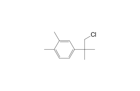 4-(1-Chloranyl-2-methyl-propan-2-yl)-1,2-dimethyl-benzene