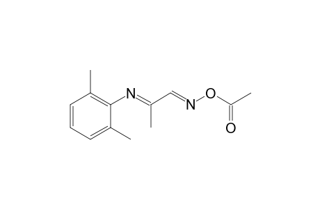 Propanal, 2-[(2,6-dimethylphenyl)imino]-, O-acetyloxime