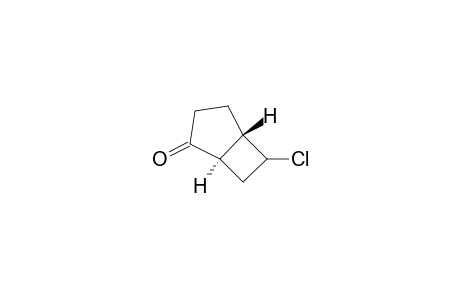 Bicyclo[3.2.0]heptan-2-one, 6-chloro-, trans-