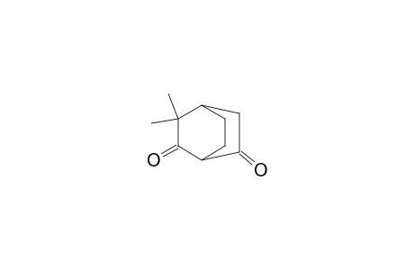 Bicyclo[2.2.2]octane-2,6-dione, 3,3-dimethyl-, (.+-.)-
