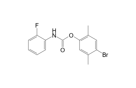 o-fluorocarbanilic acid, 4-bromo-2,5-xylyl ester