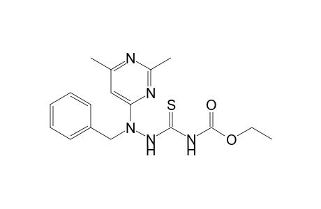 Ethyl N-[[(2,6-dimethylpyrimidin-4-yl)-(phenylmethyl)amino]carbamothioyl]carbamate
