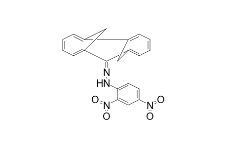 Tricyclo[7.4.1.1(3,8)]trideca-3,5,7,9,11,13-hexaene, 2-(2',4'-dinitrophenylhydrazono)-