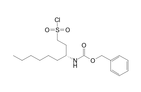 (phenylmethyl) N-[(3R)-1-chloranylsulfonylnonan-3-yl]carbamate