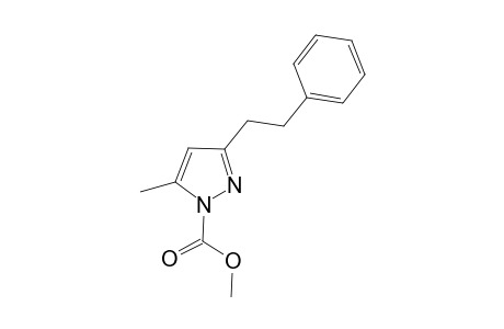 Methyl 5-methyl-3-(2-phenylethyl)pyrazole-1-carboxylate